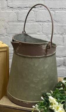 Rusty Metal Bucket With Spout .